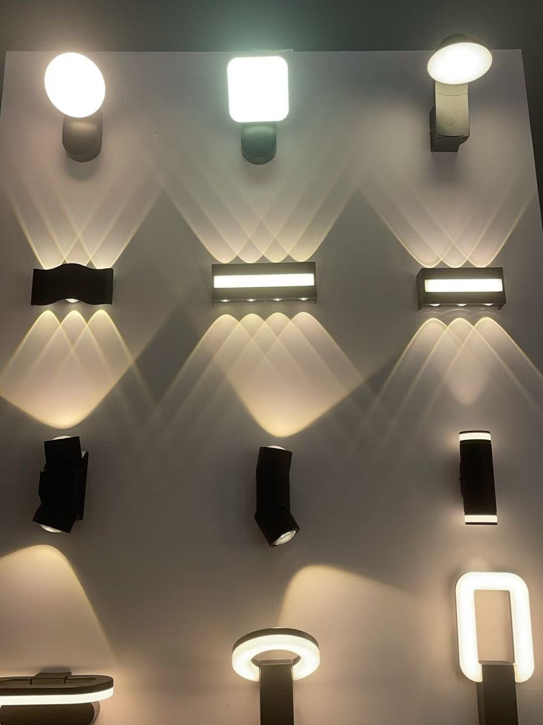 The sample wall — downlight fans against up-and-down beams